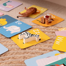 Load image into Gallery viewer, Educational children's cards with animals and letters on a textured surface