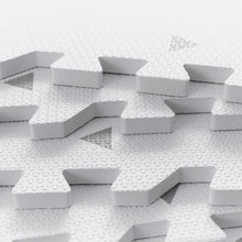 Load image into Gallery viewer, White foam playmat with triangles on a white background