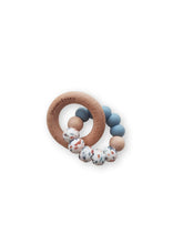 Load image into Gallery viewer, Teething ring with wooden ring and sealife design colourful beads on a white background
