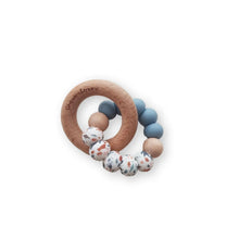 Load image into Gallery viewer, Teething ring with wooden ring and sealife design colourful beads on a white background
