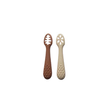 Load image into Gallery viewer, Two baby teethers, one brown and one beige, on a white background
