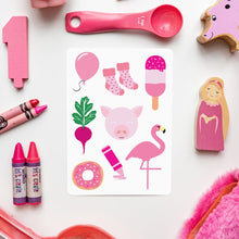 Load image into Gallery viewer, Children's toys and stationery items including crayons, a wooden doll, and a card with pink illustrations on a white background.