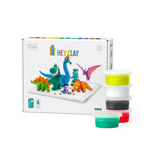 Load image into Gallery viewer, Hey Clay dinosaur play set with packaging and colorful containers on a white background