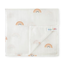 Load image into Gallery viewer, Folded baby swaddle blanket with rainbow patterns on a white background, featuring the brand 'gus & beau'.