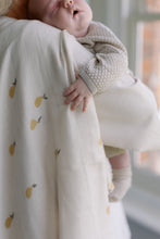 Load image into Gallery viewer, Baby held by a woman with Ralphie Bear pear design muslin over her shoulder.