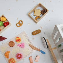 Load image into Gallery viewer, Wooden toy food set with a cutting board and knife on a light surface.