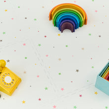 Load image into Gallery viewer, Colorful rainbow-shaped wooden toys on a white background with star patterns