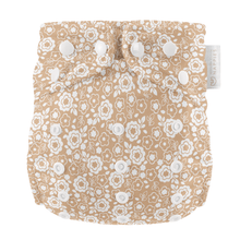 Load image into Gallery viewer, Floral-patterned cloth nappy with white flowers on a beige background