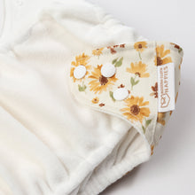 Load image into Gallery viewer, Floral-patterned cloth nappy with buttons on a white background