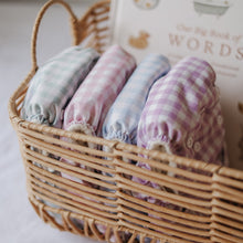 Load image into Gallery viewer, Basket with selection of checkered cloth nappies in various colours on a light background