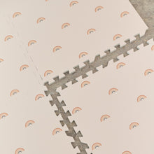 Load image into Gallery viewer, Children's play mat with rainbow pattern on beige background
