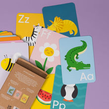 Load image into Gallery viewer, Educational alphabet cards with animals and letters on a purple background
