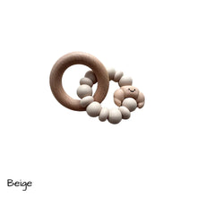 Load image into Gallery viewer, Wooden teething ring with beige beads on a white background
