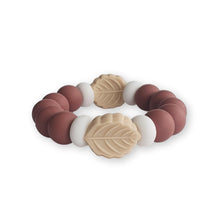 Load image into Gallery viewer, Blush Pink Silicone and with leaf components on a white background.
