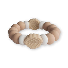 Load image into Gallery viewer, Beige and white bracelet with leaf-shaped beads on a white background
