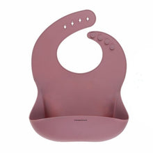 Load image into Gallery viewer, Rose coloured silicone bib on a white background
