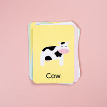 Load image into Gallery viewer, Card with a cow illustration and the word 'Cow' on a pink background
