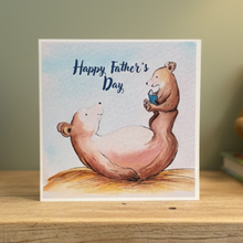 Load image into Gallery viewer, Father's Day card with two bears and a baby bear on a wooden surface.
