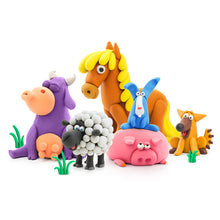 Load image into Gallery viewer, Colorful clay animal figurines on a white background

