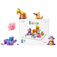 Load image into Gallery viewer, Colorful clay animal figures in front of a 'Hey Clay' packaging on a white background

