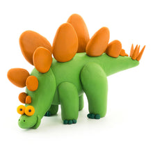 Load image into Gallery viewer, Clay dinosaur with orange spikes on a white background
