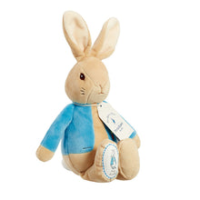 Load image into Gallery viewer, Plush toy rabbit in a blue outfit with a tag on a white background
