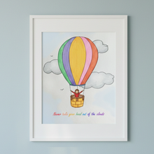 Load image into Gallery viewer, Framed artwork of a colorful hot air balloon with a child in a basket, on a light blue background.
