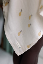 Load image into Gallery viewer, Beige muslin with lemon pattern held by a person
