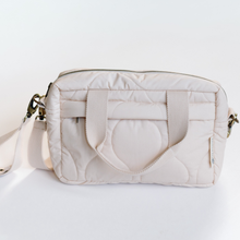 Load image into Gallery viewer, Beige quilted baby bag on a white background
