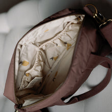 Load image into Gallery viewer, Open brown bag with a patterned interior on a light background
