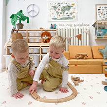 Load image into Gallery viewer, Two children playing with a wooden train set on a play mat in a child-friendly room.
