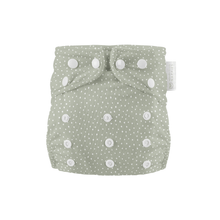 Load image into Gallery viewer, Green cloth nappy with white polka dots on a white background
